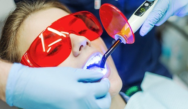 Woman receiving dental bonding