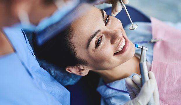 Woman receiving dental treatment