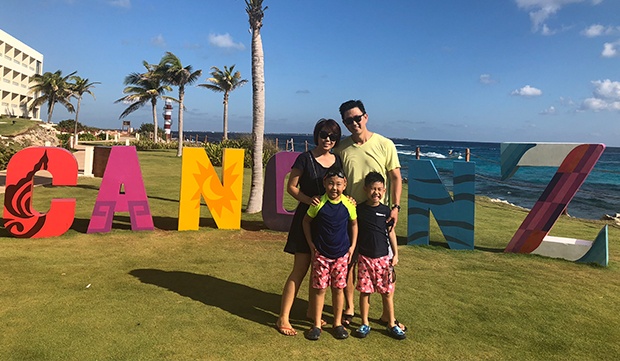 Dr. Kim and her family outdoors