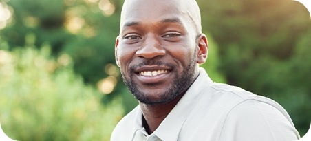 Smiling man outdoors