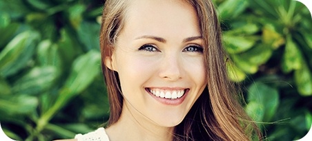 Smiling woman outdoors